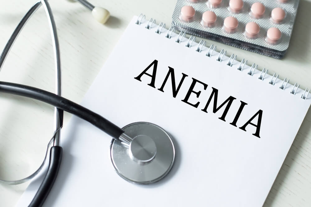 In the Notebook Is the Text of Anemia, Next to the Stethoscope and Pills