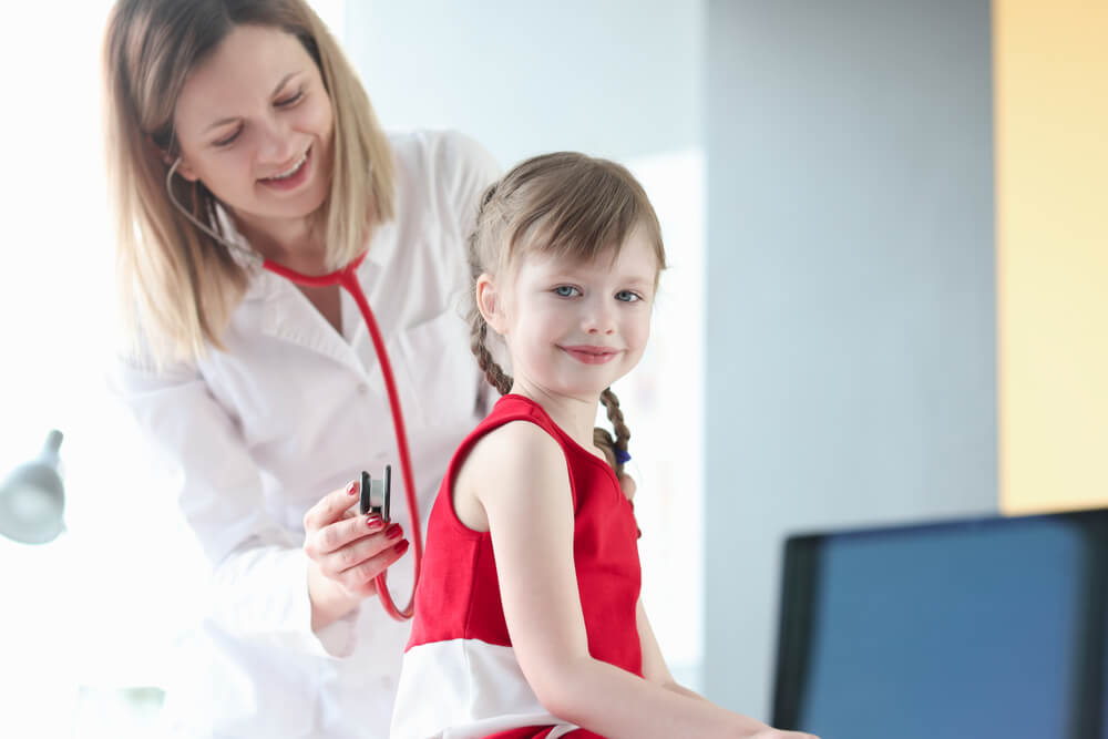 Doctor and little girl