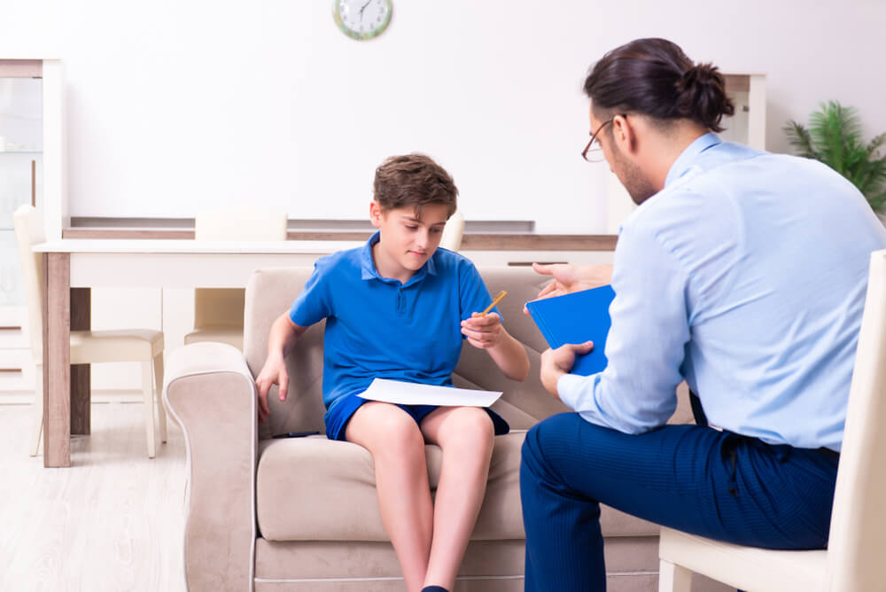 Boy Talking to Therapist