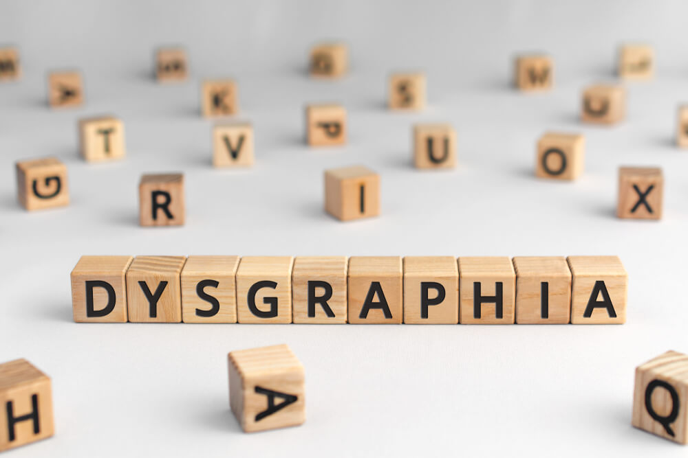 Dysgraphia - Word From Wooden Blocks With Letters, Brain Disease or Damage