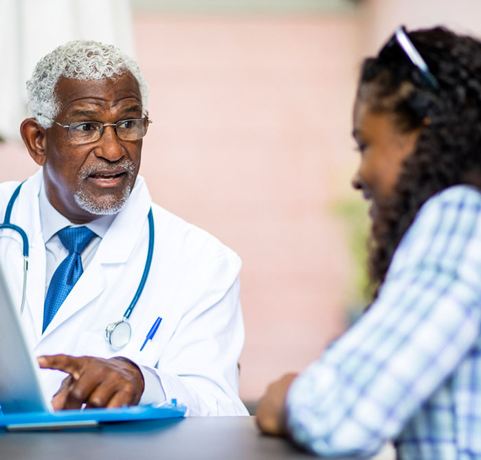 Senior-Black-Doctor-Meeting-with-Young-Black-Woman
