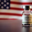 Vaccine for COVID-19 in Front of American Flag